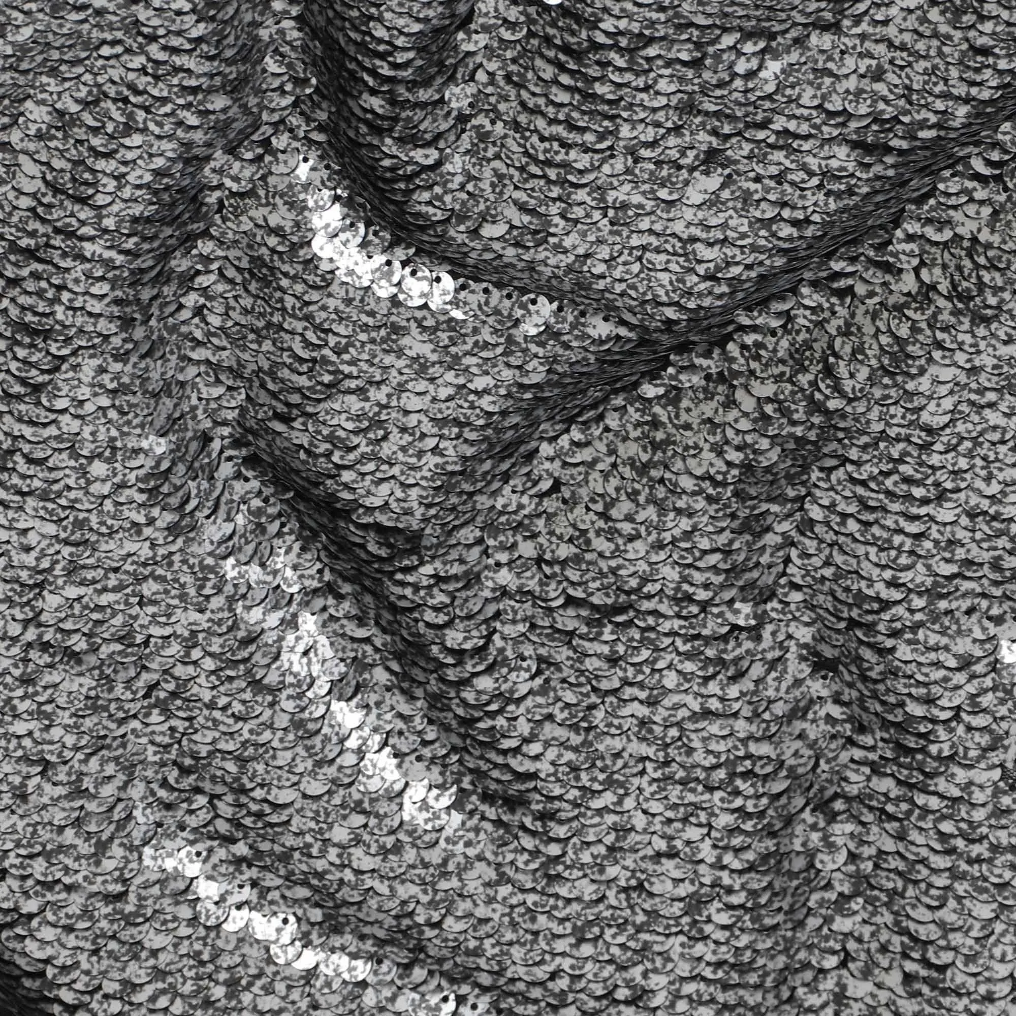 Black nylon tulle fabric with silver grey printed sequins in party wear design