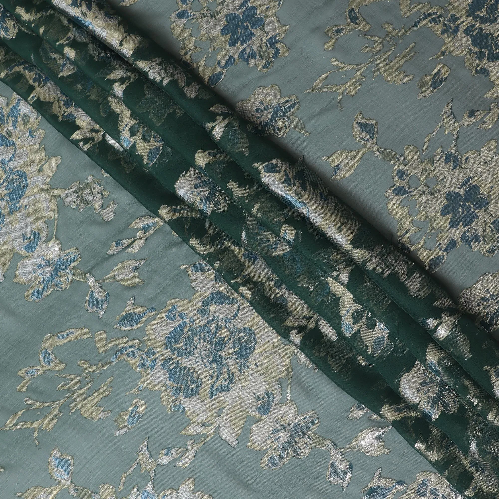 Bottle green premium pure silk chiffon fabric with baby blue viscose and gold metallic lurex in floral design-D12518