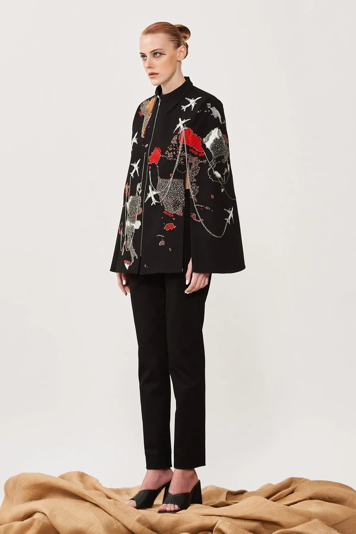 Dee Ghose in Map Cape With Narrow Pants