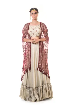 Hand Embroidered Blouse & Ruffle Lehenga Set with a Heavy Embroidered Tasselled Cape