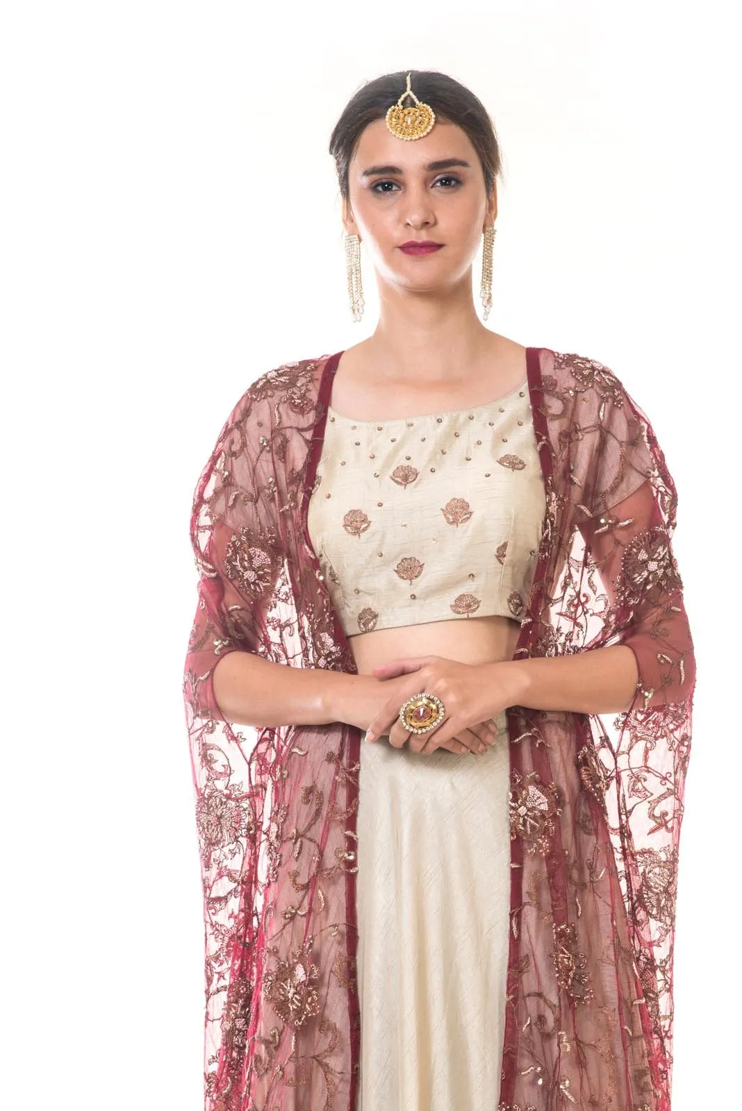 Hand Embroidered Blouse & Ruffle Lehenga Set with a Heavy Embroidered Tasselled Cape